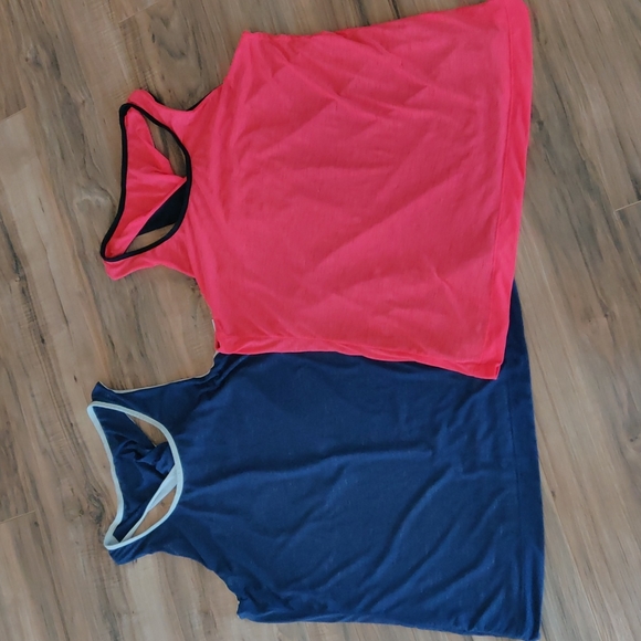 Fabletics Tops - Pair of Fabletics reversible twist tank tops
